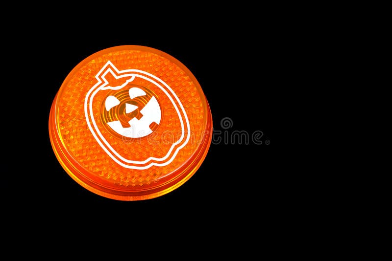 Indicatore luminoso di sicurezza del riflettore di Hallowe'en fotografia stock libera da diritti Indicatore luminoso di sicurezza del riflettore di Hallowe'en fotografia stock libera da diritti