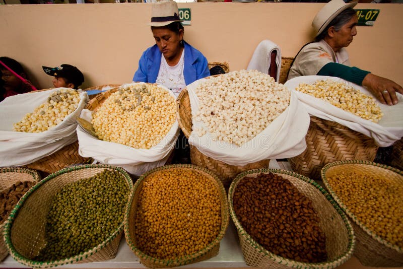 Indigenous woman selling mote hominy in Gualaceo