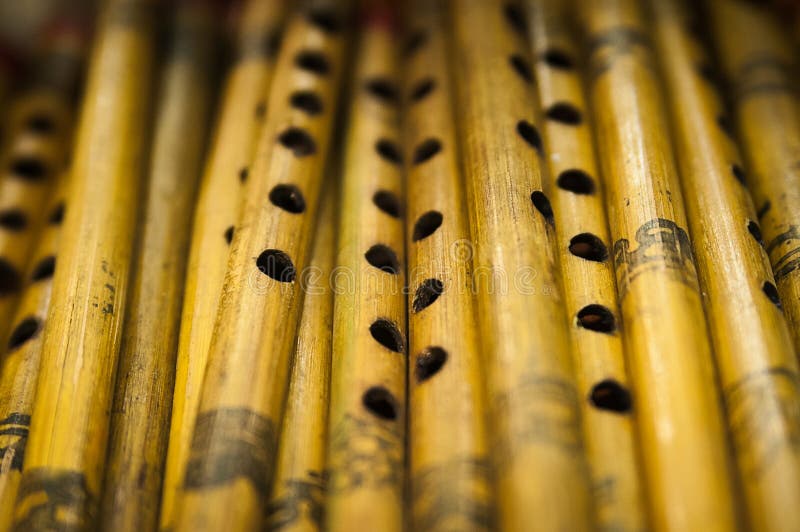 Photo of brown indian wooden flutes from the indian exhibition. Photo of brown indian wooden flutes from the indian exhibition