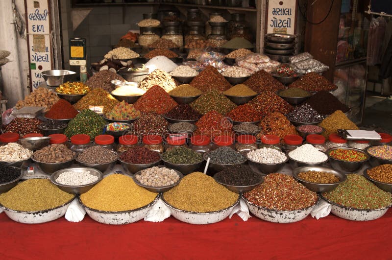 Bowls of nuts, pulses and spices on a market stall in Ahmadabad, Gujarat, India. Bowls of nuts, pulses and spices on a market stall in Ahmadabad, Gujarat, India