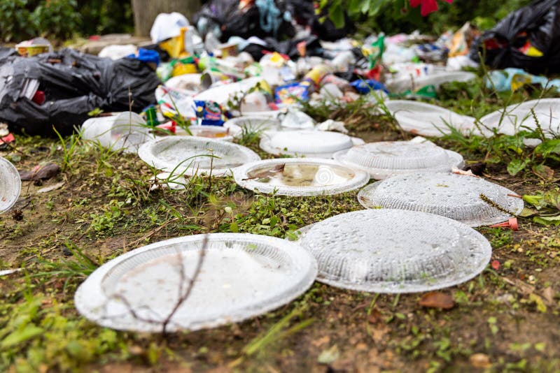 Indiscriminate litter of plastic non-biodegradable at garbage dump