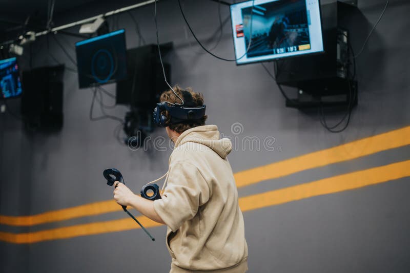 Person Enjoying Immersive Virtual Reality Gaming Using a VR ...
