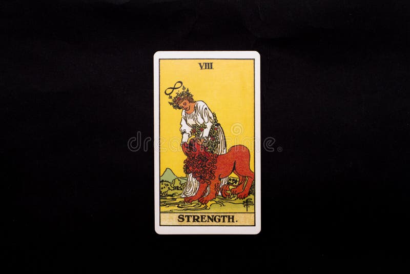 An individual major arcana tarot card isolated on black background. Strength.