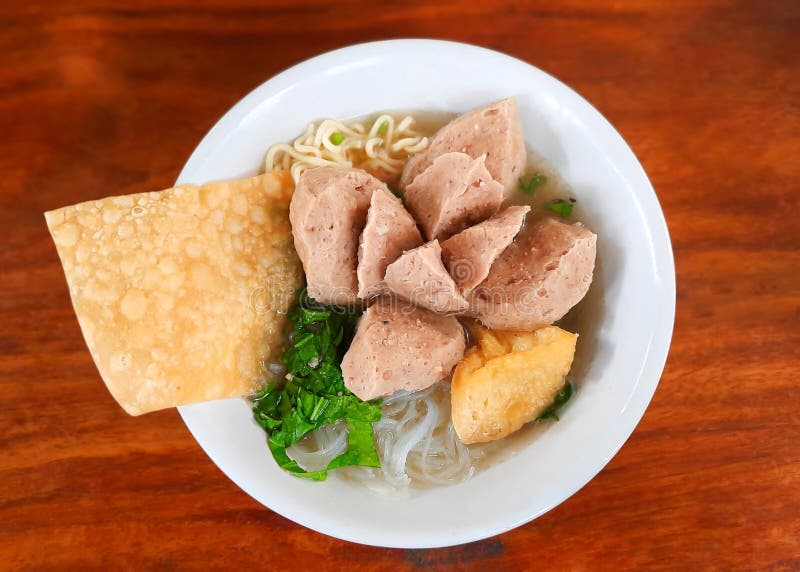 Indonesia Meatball Soup Stuffed with Beef Meat, Yellow Noodles