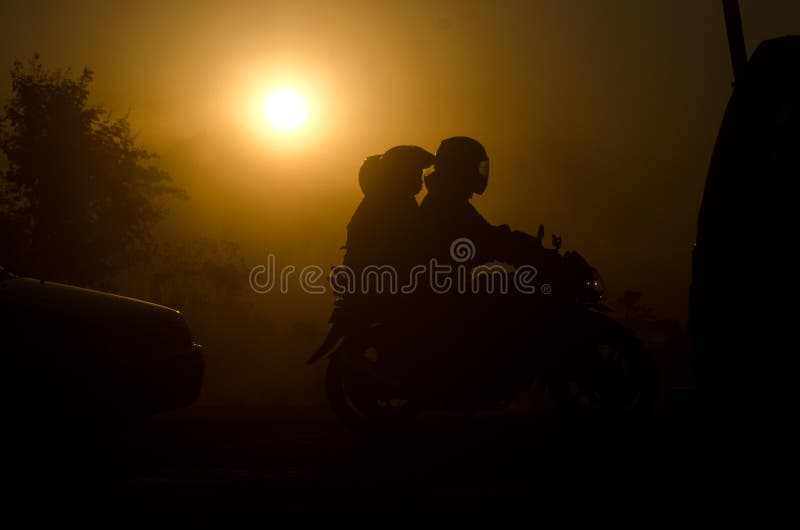 INDONESIA TO CUT BUDGET DEFICIT IN 2019. Silhouette of traffic in Klaten, Java, Indonesia. Indonesia aims to cut its budget deficit to 1 percent of gross stock photography INDONESIA TO CUT BUDGET DEFICIT IN 2019. Silhouette of traffic in Klaten, Java, Indonesia. Indonesia aims to cut its budget deficit to 1 percent of gross stock photography