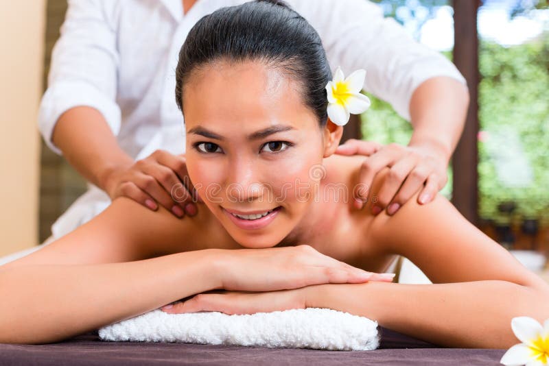 Indonesian Asian woman in wellness beauty day spa