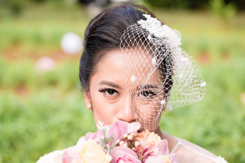 Indonesian bride on her wedding royalty free stock photo