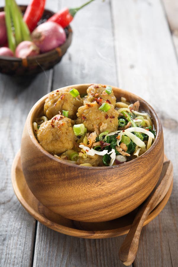 Mee bakso or Indonesian meatball noodles, popular Indonesian local food. Fresh hot with steam smoke. Mee bakso or Indonesian meatball noodles, popular Indonesian local food. Fresh hot with steam smoke.