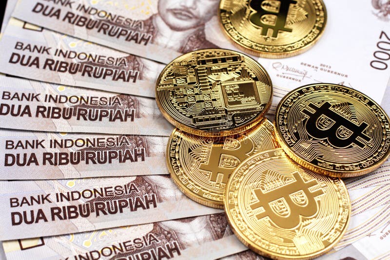 A Close Up Image Of Indonesian 2000 Rupiah Notes With Gold Bitcoins ...