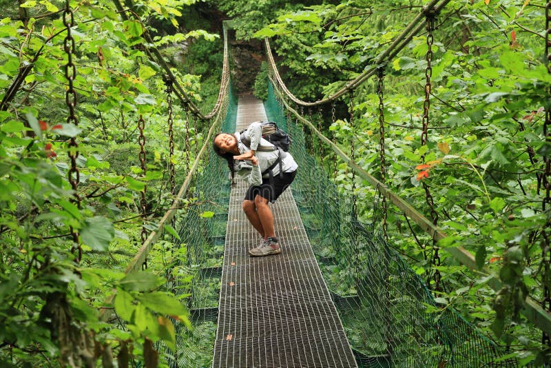 Girl posing on iron bridge in Slovak Paradise stock images Girl posing on iron bridge in Slovak Paradise stock images