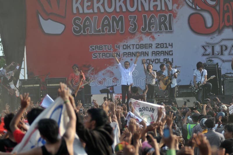 BOYOLALI, INDONESIA - October 04: Indonesian President elect, Joko Widodo greets supporters during a concert titled Greetings Three Finger, a symbol for the unity of Indonesia in Boyolali, Central Java, Indonesia, on October 04, 2014. This concert was to celebrated the victory of Joko Widodo as well as an expression of gratitude to the supporters. Joko Widodo will be sworn in as president on October 20. BOYOLALI, INDONESIA - October 04: Indonesian President elect, Joko Widodo greets supporters during a concert titled Greetings Three Finger, a symbol for the unity of Indonesia in Boyolali, Central Java, Indonesia, on October 04, 2014. This concert was to celebrated the victory of Joko Widodo as well as an expression of gratitude to the supporters. Joko Widodo will be sworn in as president on October 20.