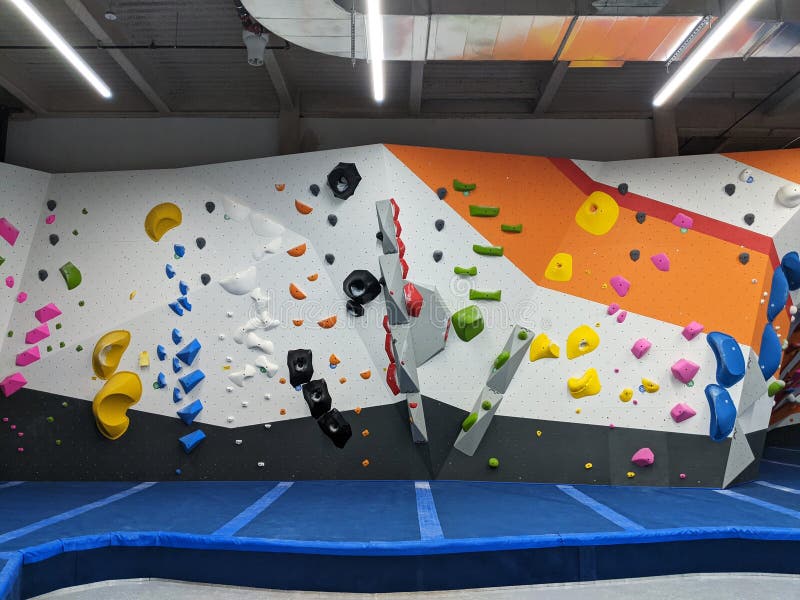 Indoor Bouldering and Climbing Wall for Training at a Modern Gym Stock