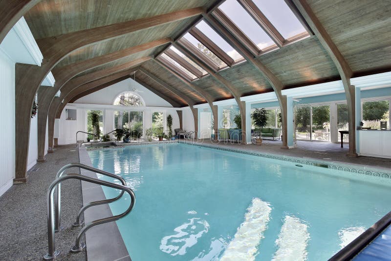 Indoor pool with skylights stock images