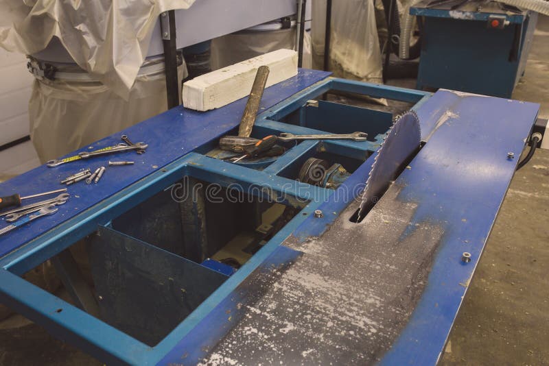 Industrial automotive machine tool equipment with circular blade, industry manufacturing woodwork background stock images Industrial automotive machine tool equipment with circular blade, industry manufacturing woodwork background stock images