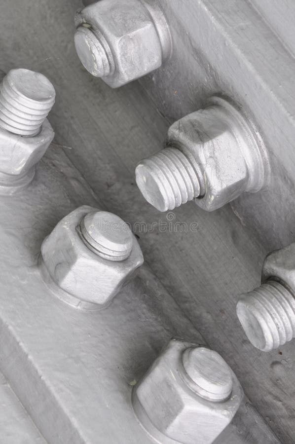 Industrial bolts and nuts stock photo. Image of technician 44057916