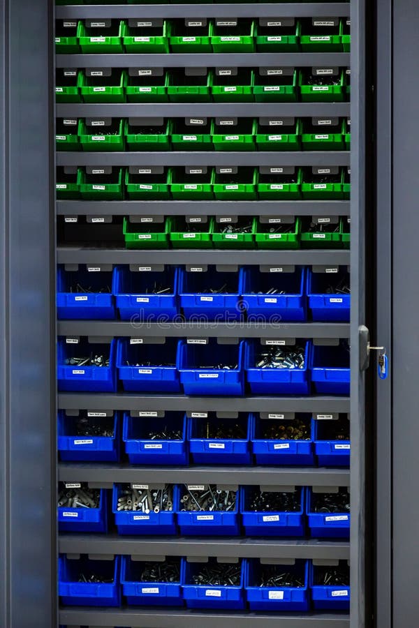Industrial cabinets with huge variety of boxes stock photo