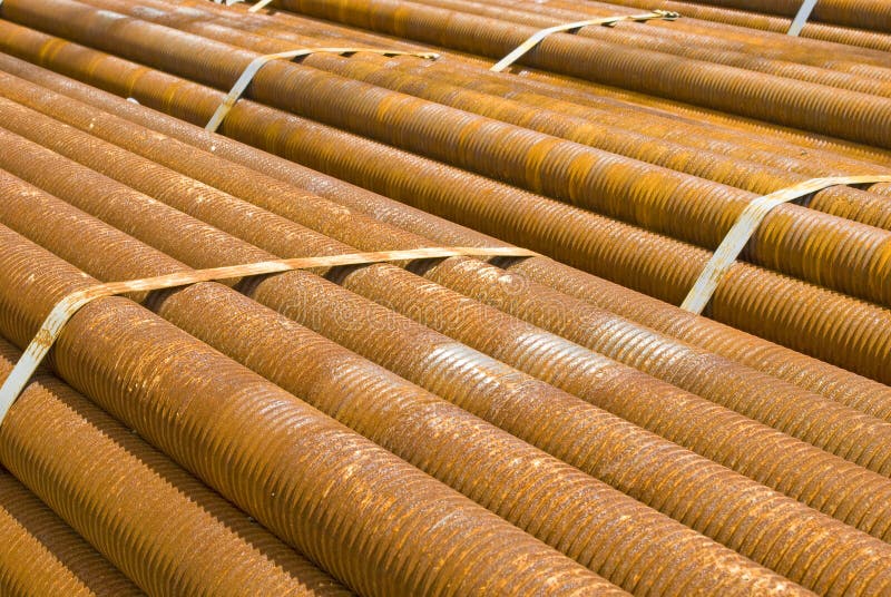 Industrial cargo for shipment: rusty pipes