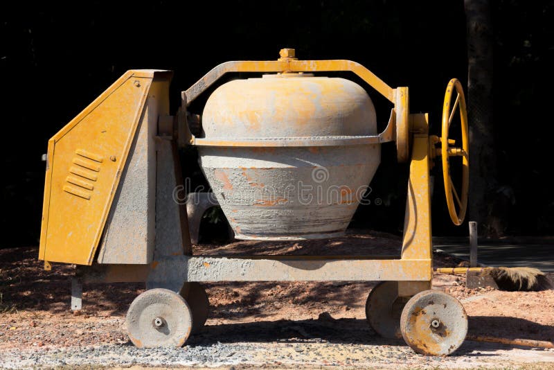 Industrial Cement Mixer Machine at Construction Site. Stock Photo