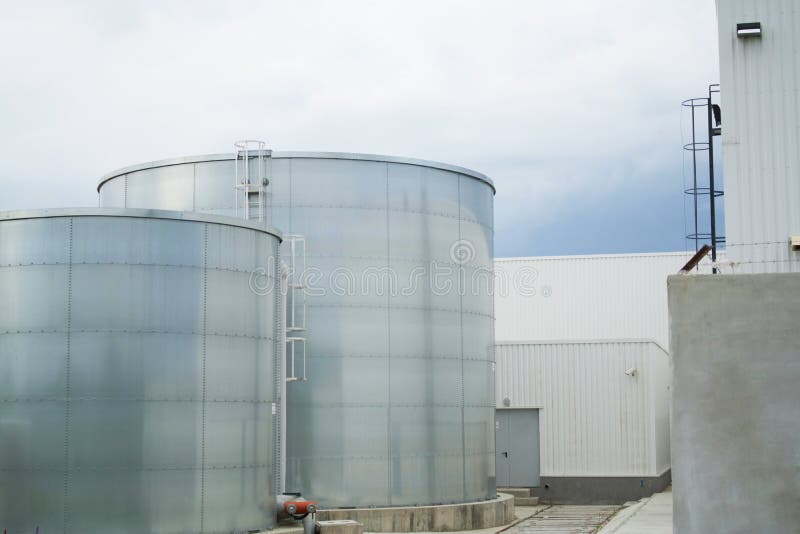 Industrial cisterns stock image. Image of cloudy, cistern 28656323