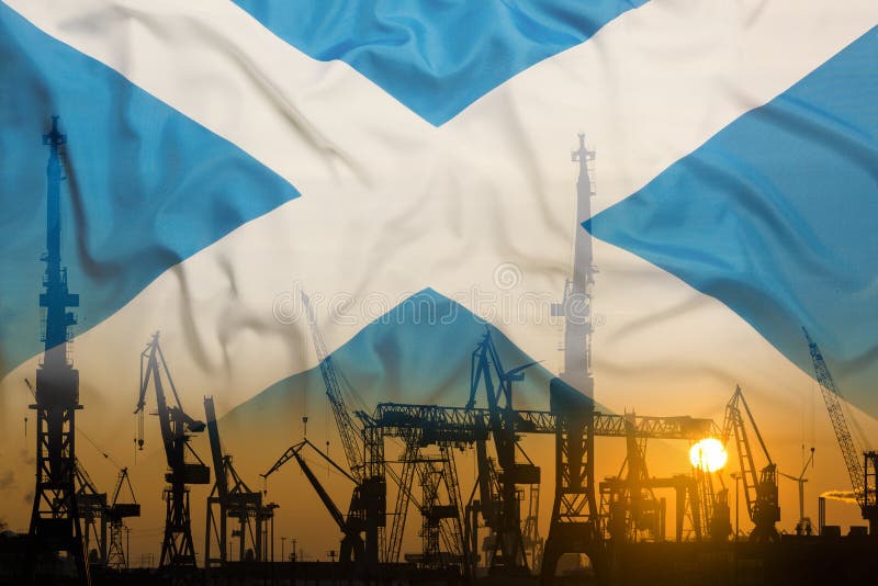 Industrial concept with Scotland flag at sunset