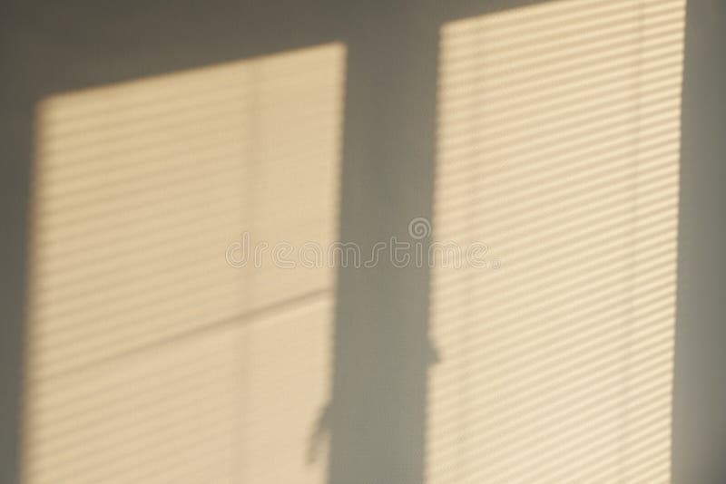 Industrial design window sunlight parallel lines shadows. Light and shadow from the window. Thin lines of light on the