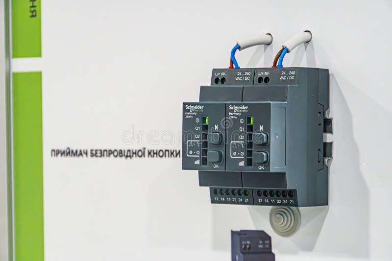 Industrial exhibit with a control panel machine, part of an assembly line Gray and black color palette, artificial lighting stock photos