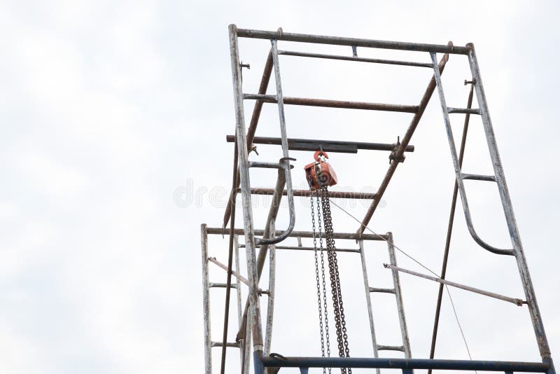 Industrial hook hanging stock photo. Image of power 107235024