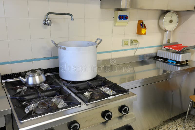 Industrial Kitchen with Very Big Pot on the Stove Stock Photo Image