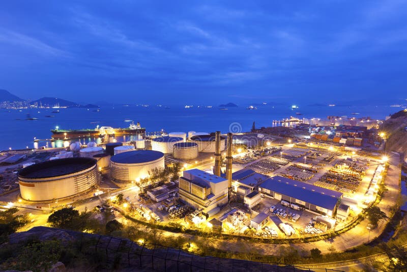 Industrial oil tanks at night