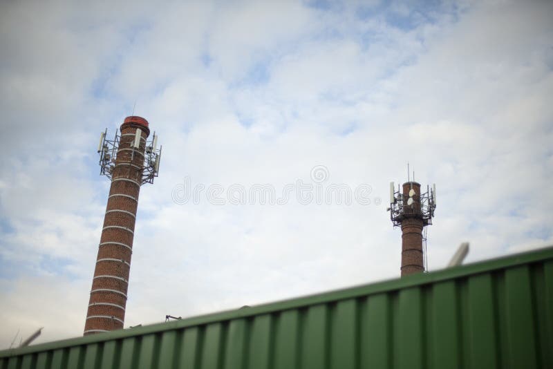 Industrial pipe. The pipe of the plant is made of brick stock image