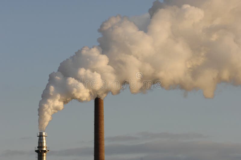 Industrial pipe pollutes air stock images