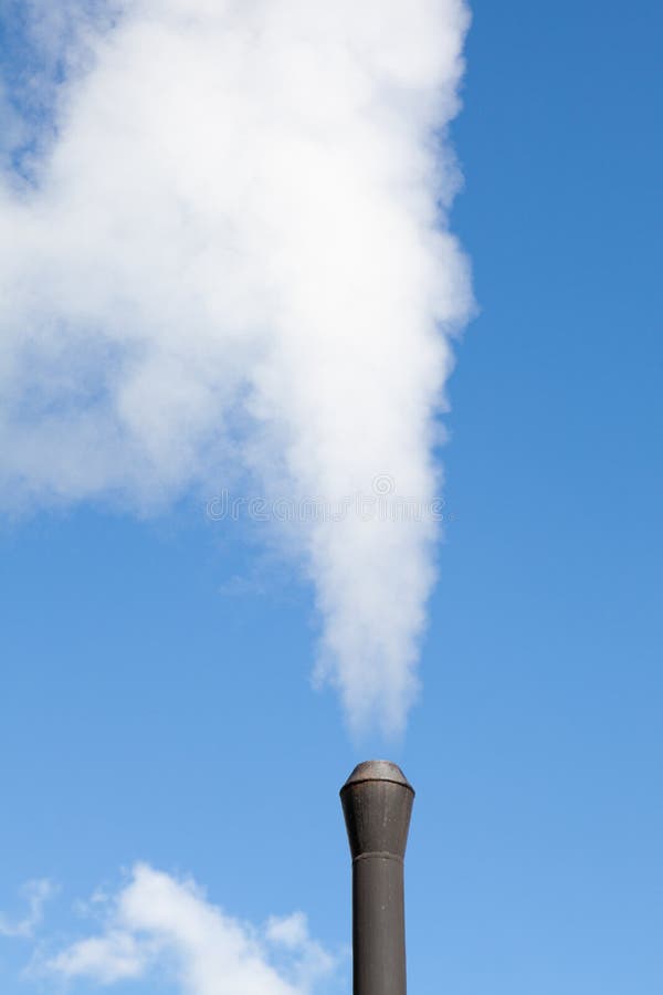 Industrial pipe polluting white steam royalty free stock photo