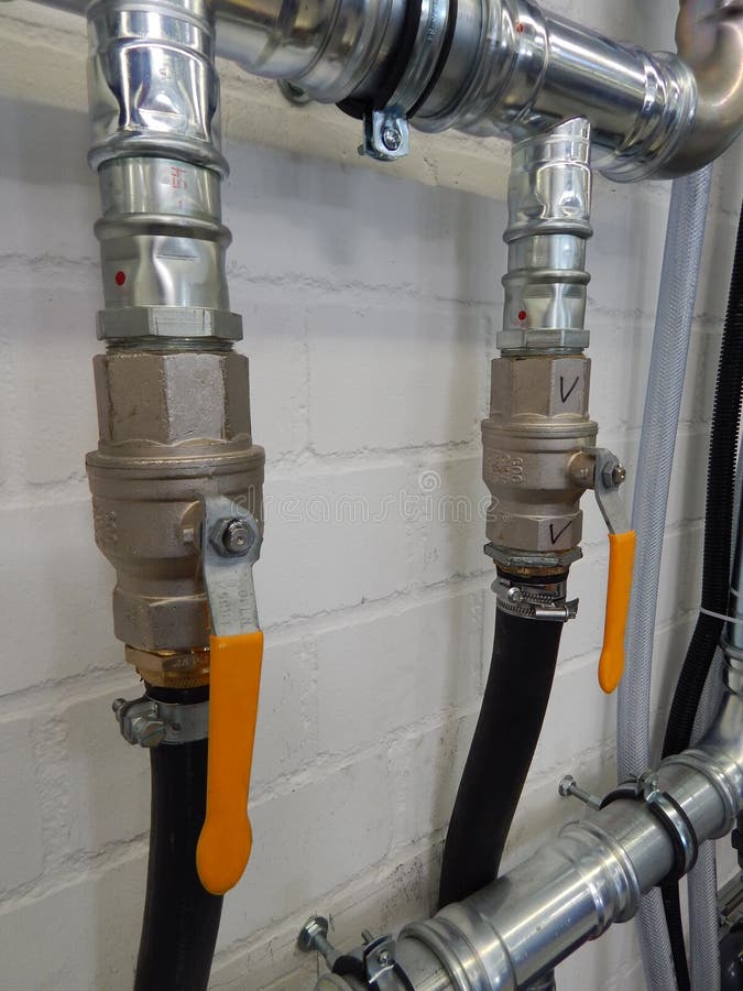 Industrial plumbing pipes stock photo. Image of build 40363956