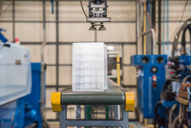 Industrial robot working in factory royalty free stock photography