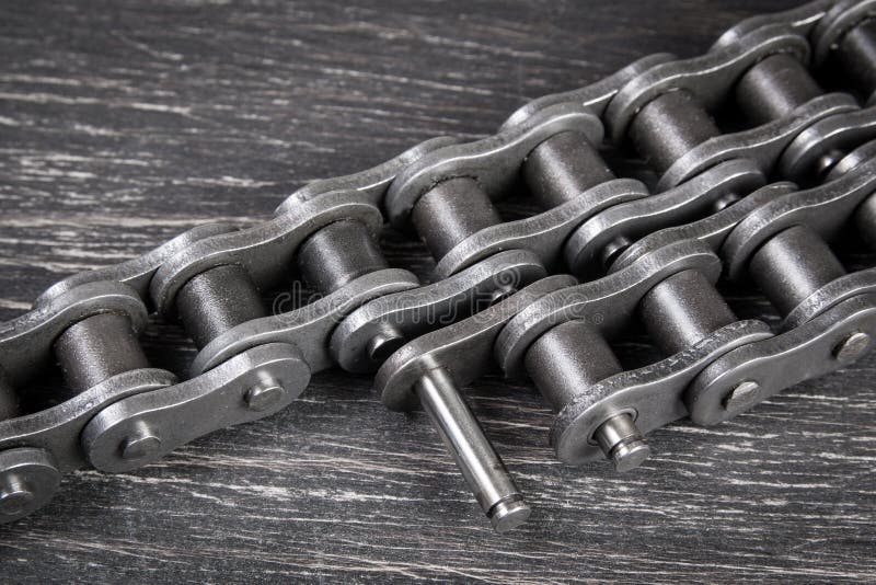 Industrial roller chain stock photo. Image of hanging 67489948