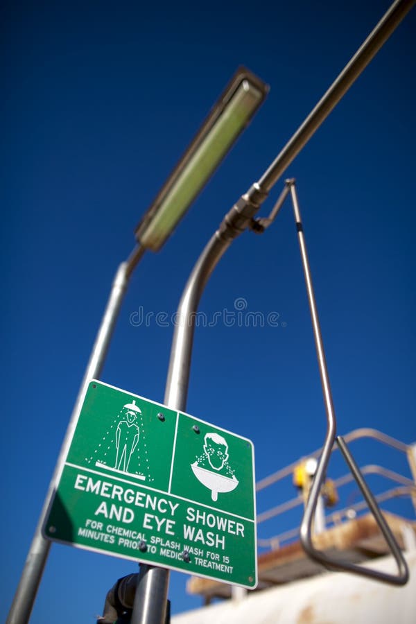 Industrial safety shower sign and eyes wash emergency station at construction mine site Perth, Pilbara Australia