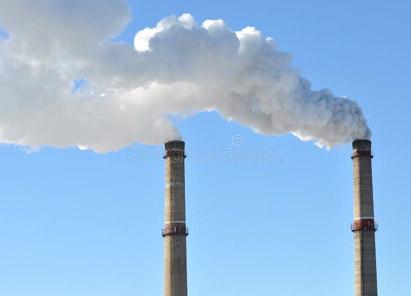 Industrial smoke from chimney royalty free stock photo