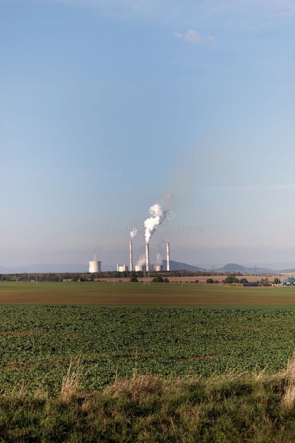 Industrial towers stock photo. Image of foliage, plants 27577532