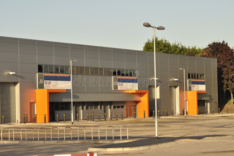 Modern Industrial warehouse and retail units waiting to be let. Industrial lights stock images, royalty-free photos and pictures