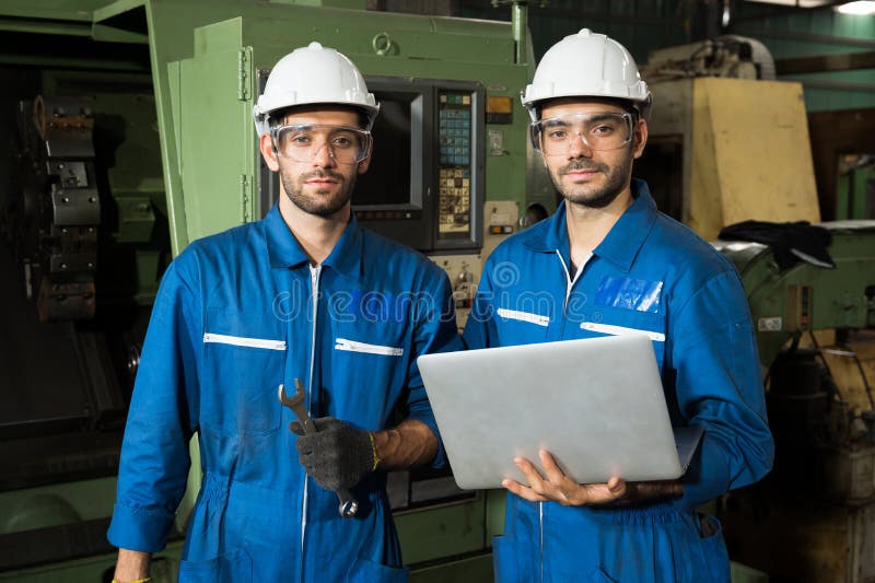 Industrial Workers are Working on Projects in Large Industrial Plants