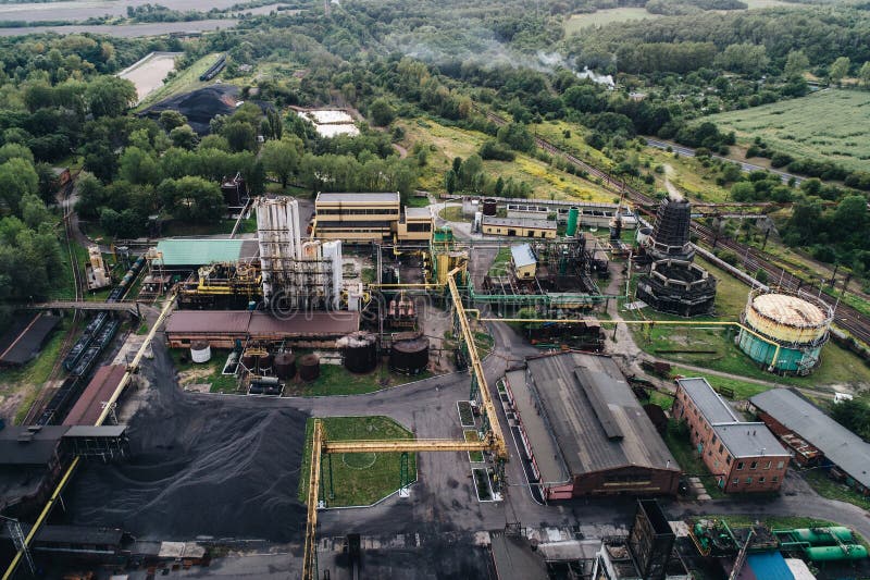 Industrial zone. Aerial view on old working cooking plant.