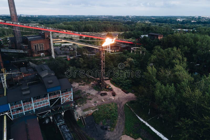 Industrial zone. Aerial view on old working cooking plant.