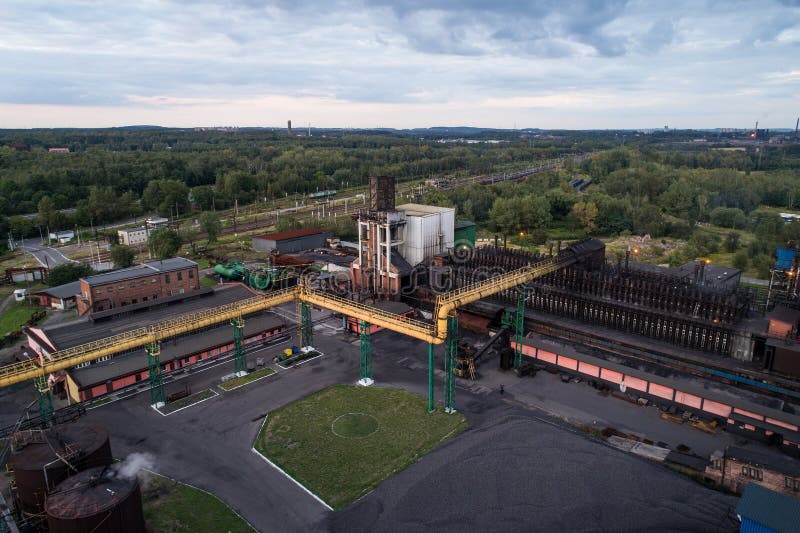 Industrial zone. Aerial view on old working cooking plant.