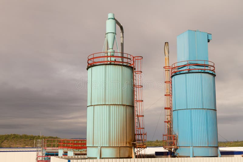 Industrial Exhaust Silos structures outside an factory. Industrial Exhaust Silos structures outside an factory