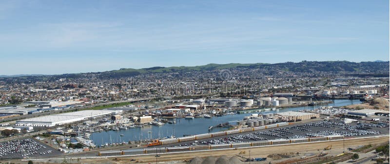 An aerial panoramic view of ship building factories, car manufacturing plants and oil refineries, in Richmond, California. An aerial panoramic view of ship building factories, car manufacturing plants and oil refineries, in Richmond, California.