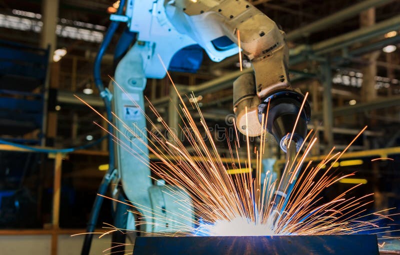 Industrieroboter schweißt Versammlungsautomobilanteil an Autofabrik lizenzfreies stockbild Industrieroboter schweißt Versammlungsautomobilanteil an Autofabrik lizenzfreies stockbild