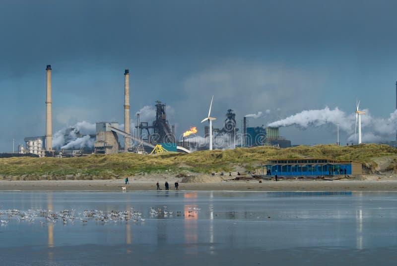 People enjoy the beach of Ijmuiden near the Tata Steel plant on News  Photo - Getty Images