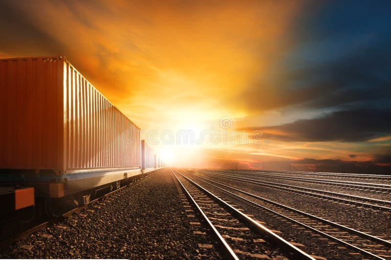 Industry container trains running on railways track against beau