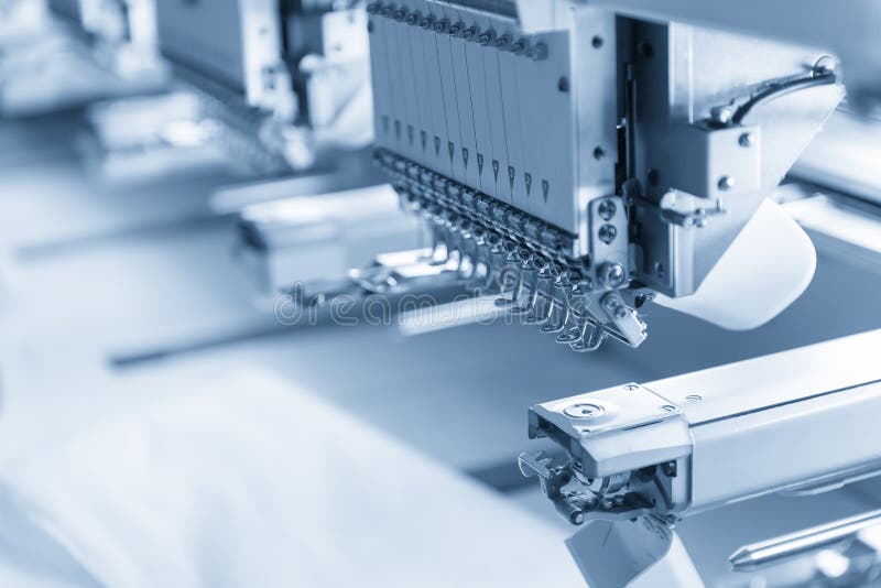 The industry sewing machine in the light blue scene. Closeup machine tool stock images, royalty-free photos and pictures