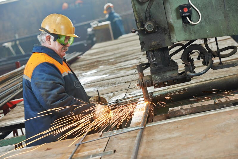 Industry worker at spot welding machine royalty free stock images Industry worker at spot welding machine royalty free stock images